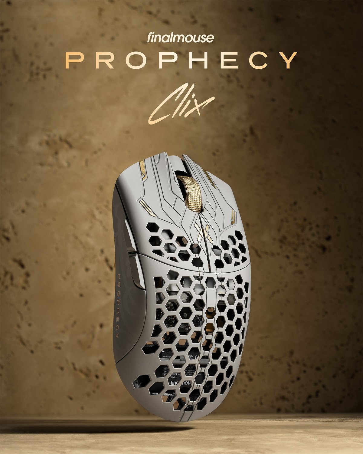 A white UltralightX Prophecy mouse against a sandstone background