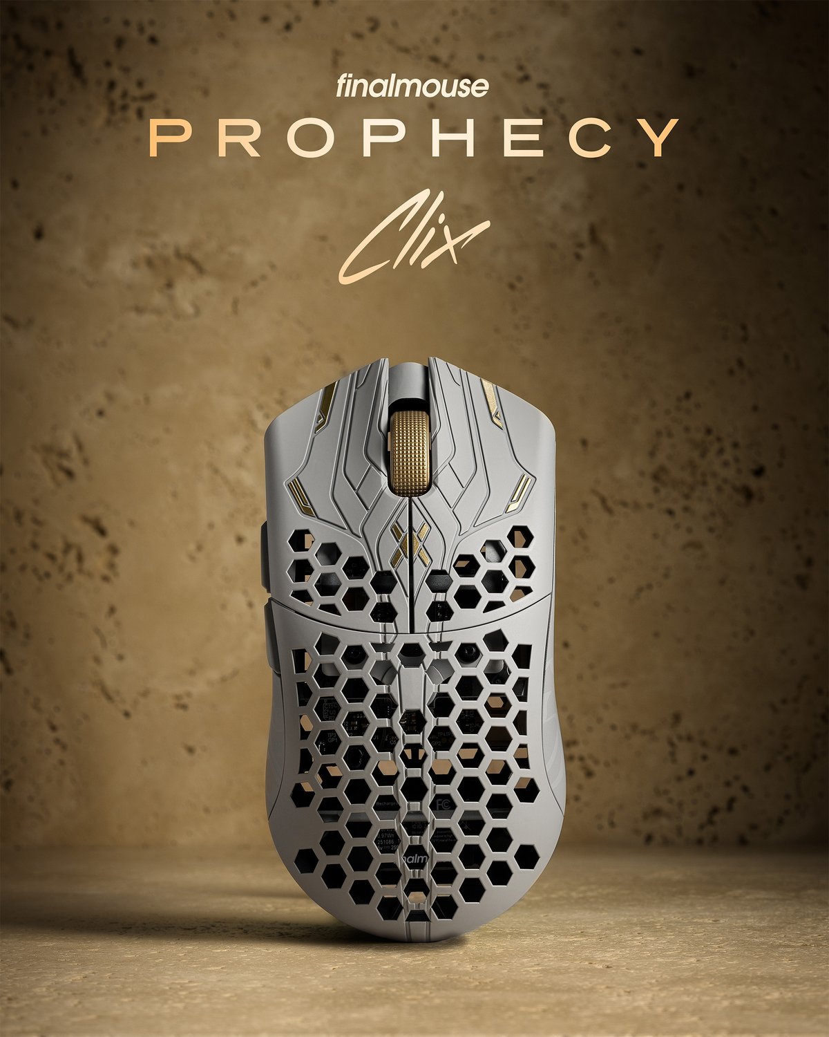 A white UltralightX Prophecy mouse against a sandstone background